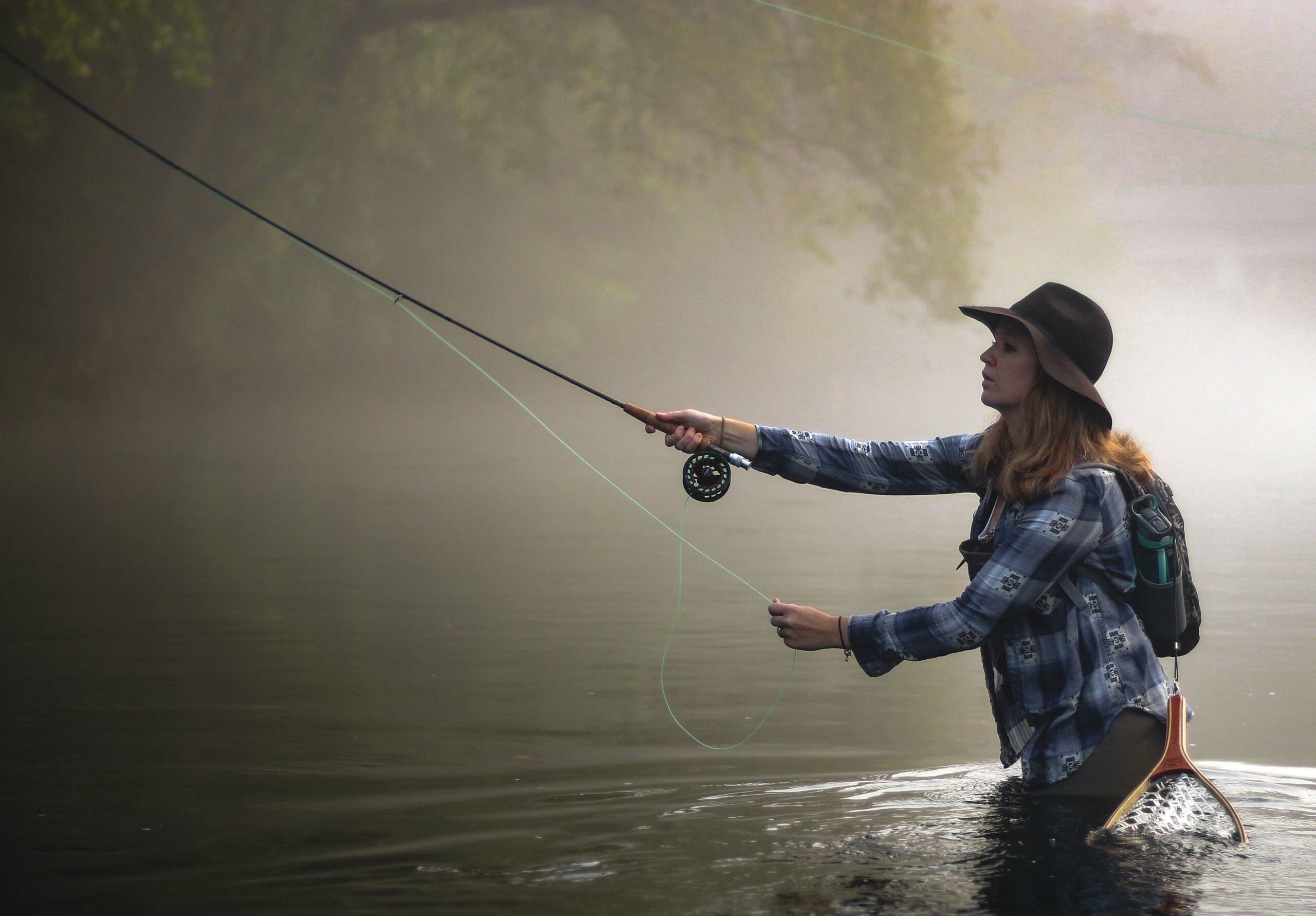 Angler casts her fly in Tennessee waters