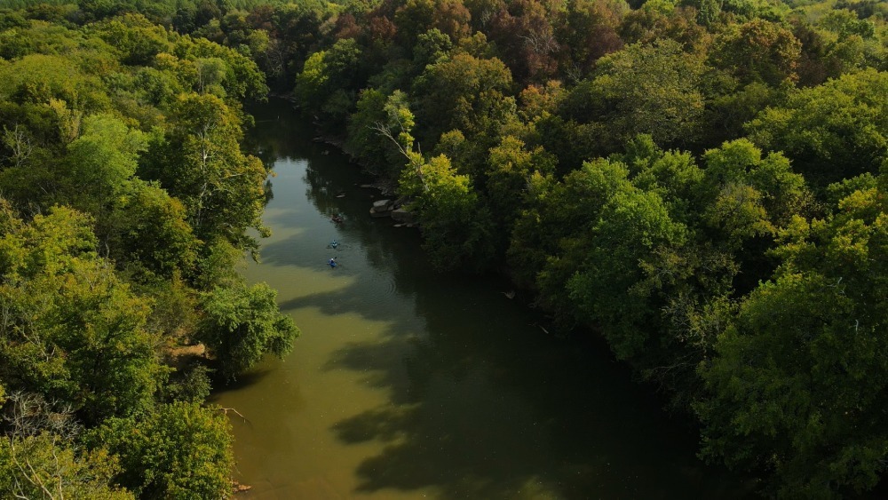 Aerial photo of three people kayaking on the Duck River