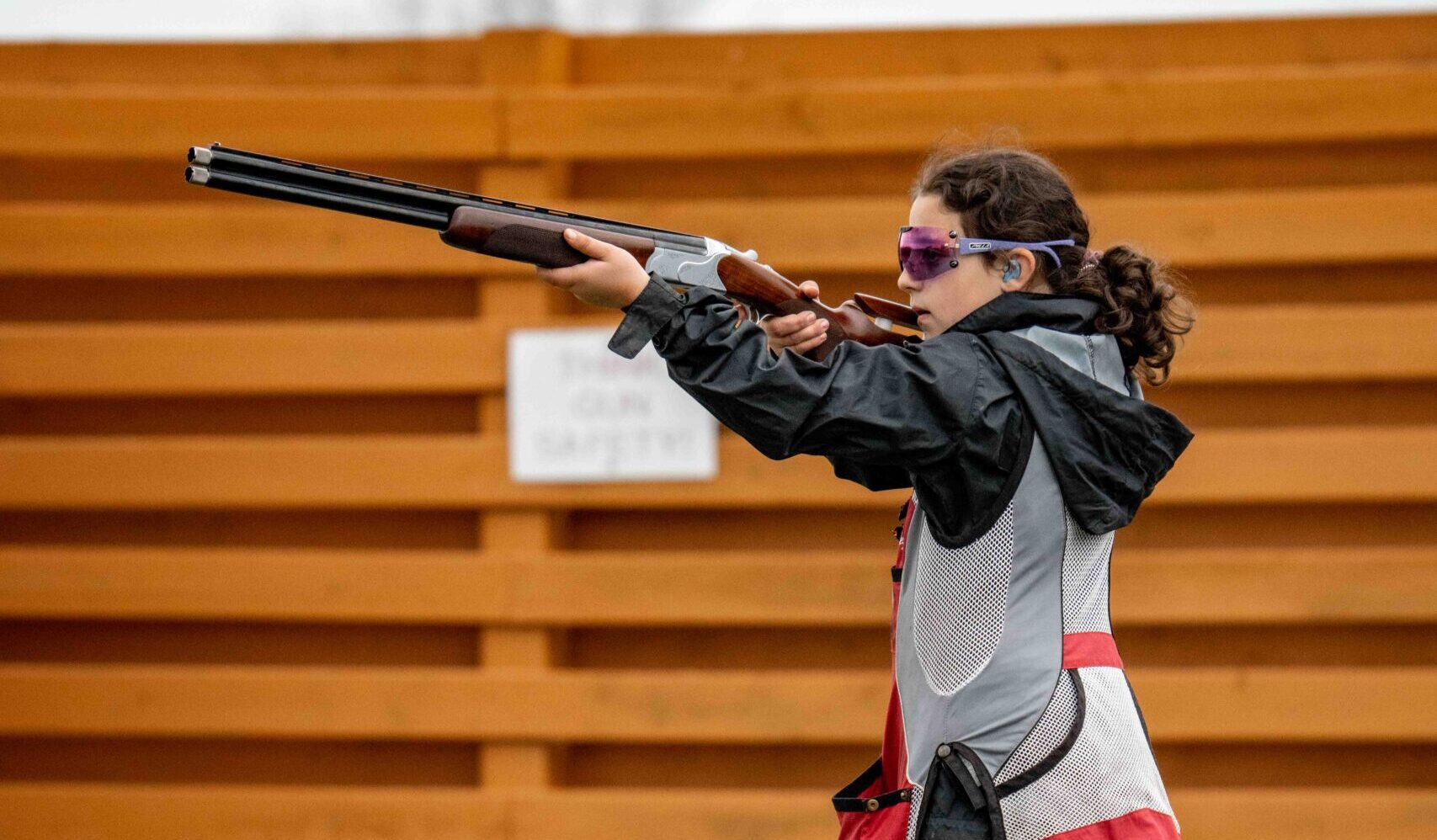 Young girl about to take a shot.